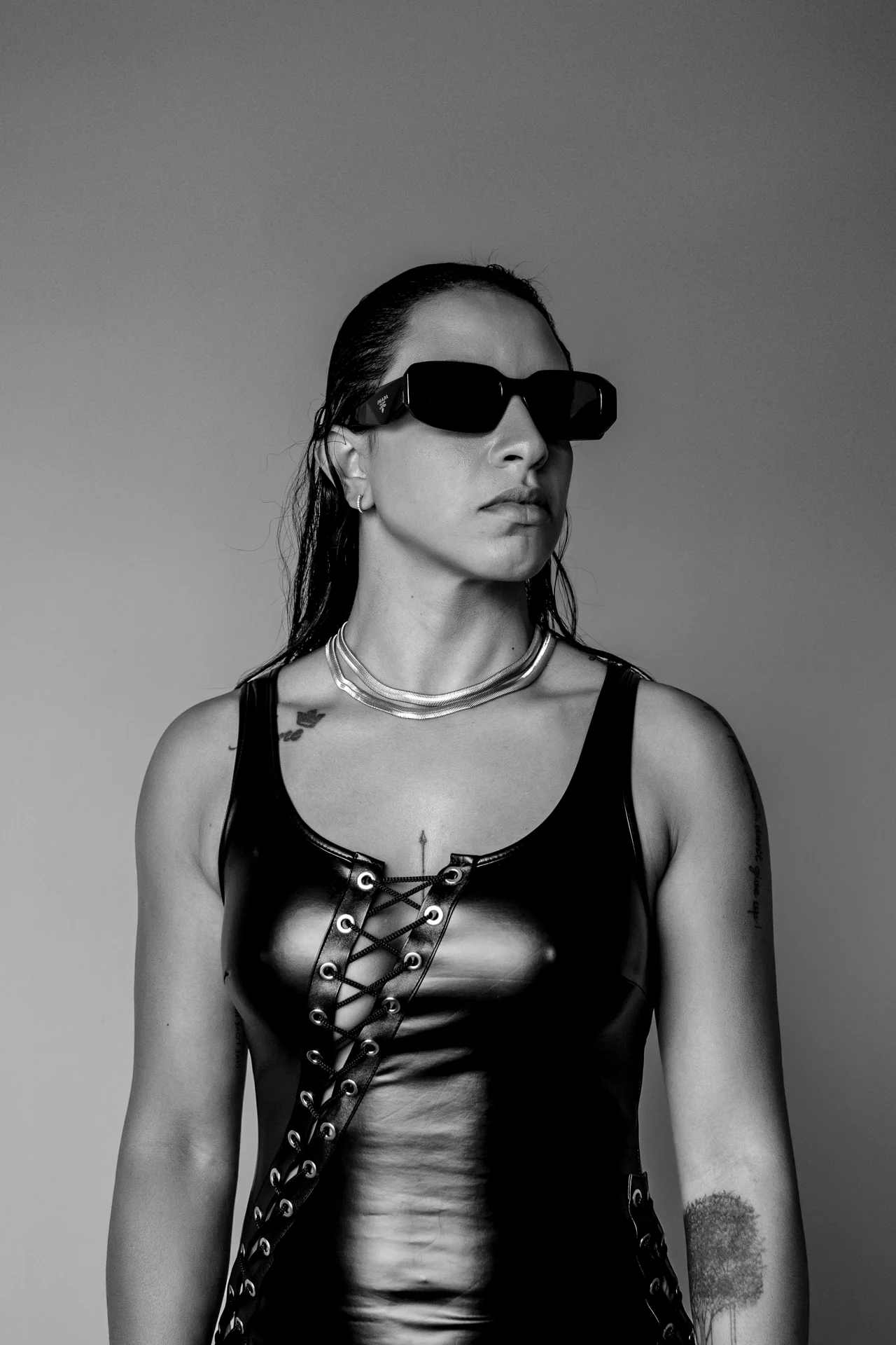 Black and white studio portrait of Darah